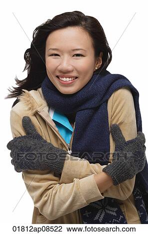 Woman freezing and smiling at camera View Large Photo Image Stock Image - Woman freezing and smiling at camera. Fotosearch