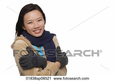 Woman freezing and smiling at camera View Large Photo Image Stock Image - Woman freezing and smiling at camera. Fotosearch