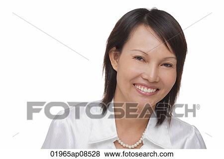 Woman smiling at camera View Large Photo Image Stock Photo - Woman smiling at camera. Fotosearch