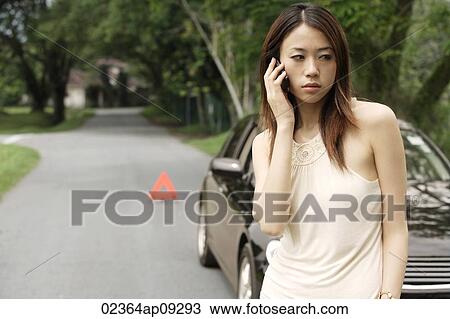 Angry woman on phone, broken car View Large Photo Image Stock Image - Angry woman on phone, broken car. Fotosearch