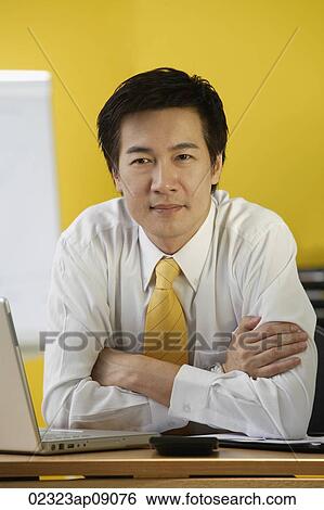 Businessman in office View Large Photo Image Stock Photograph - Businessman in office. Fotosearch