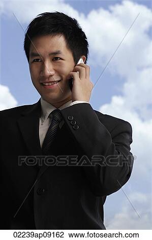 businessman on mobile phone View Large Photo Image Stock Image - businessman on mobile phone. Fotosearch