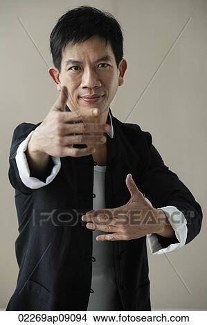 Man in martial arts pose View Large Photo Image Picture - Man in martial arts pose. Fotosearch