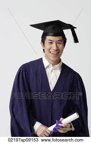 Stock Image - Man with diploma. Fotosearch