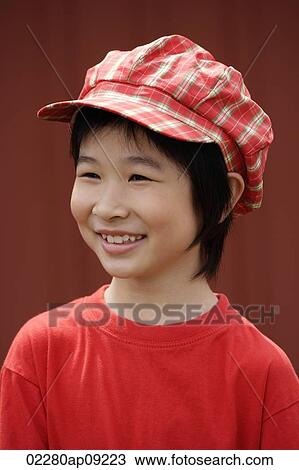 Portrait of little girl in plaid hat View Large Photo Image Stock Image - Portrait of little girl in plaid hat. Fotosearch