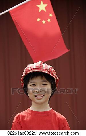 Portrait of little girl standing under Chinese flag View Large Photo Image Stock Photography - Portrait of little girl standing under Chinese flag. Fotosearch