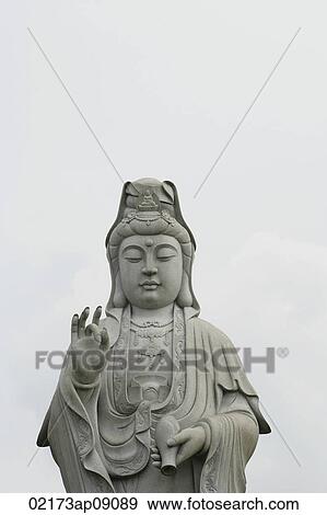 Stone Buddha statue View Large Photo Image Stock Photo - Stone Buddha statue. Fotosearch