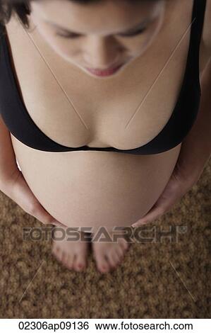Top view of pregnant woman View Large Photo Image Stock Photograph - Top view of pregnant woman. Fotosearch