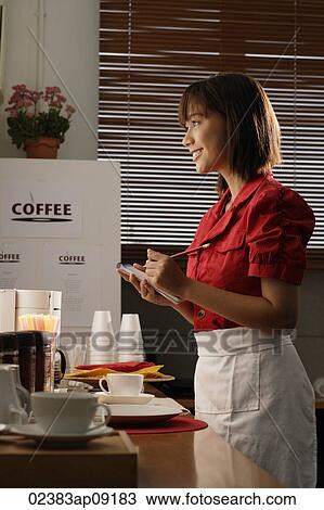 Waitress in diner taking order View Large Photo Image Stock Image - Waitress in diner taking order. Fotosearch