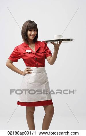 Waitress serving coffee View Large Photo Image Stock Image - Waitress serving coffee. Fotosearch