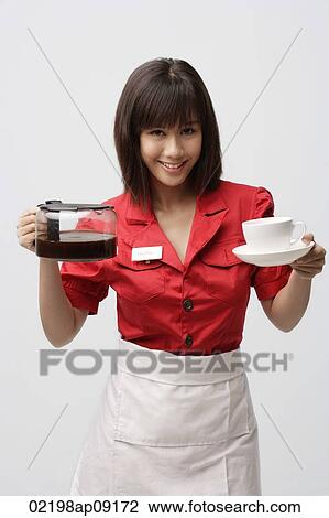 Waitress serving coffee View Large Photo Image Stock Image - Waitress serving coffee. Fotosearch