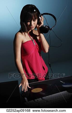 Young woman DJ View Large Photo Image Stock Photo - Young woman DJ. Fotosearch