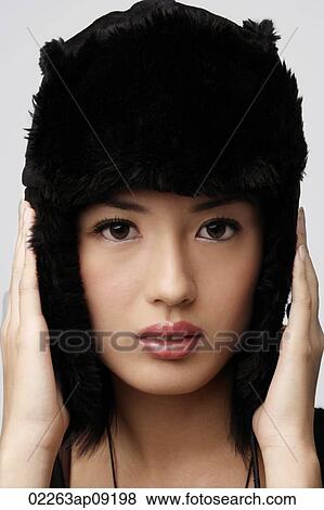 Young woman with winter hat View Large Photo Image Stock Photo - Young woman with winter hat. Fotosearch