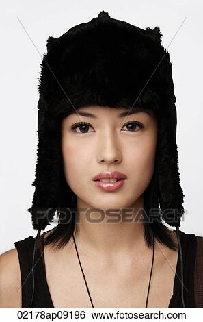 Young woman with winter hat View Large Photo Image Stock Photograph - Young woman with winter hat. Fotosearch