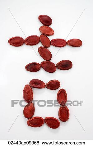 Chinese character for "luck" formed with red melon seeds View Large Photo Image Stock Photo - Chinese character for "luck" formed with red melon seeds. Fotosearch