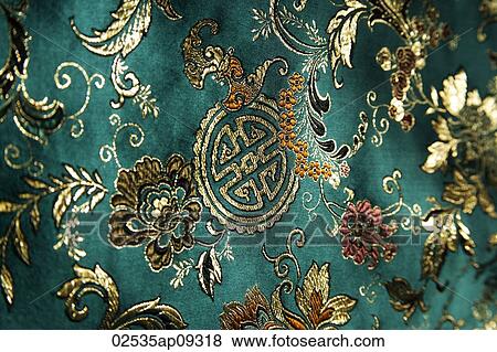 Stock Photo - Detail of jade green Chinese silk fabric. Fotosearch