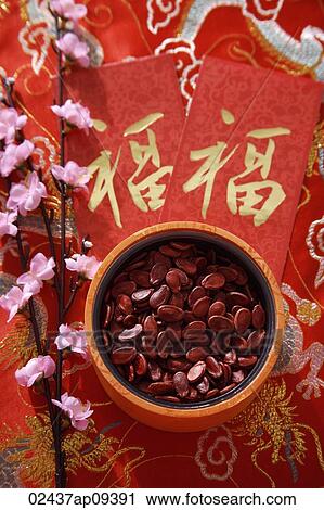 Still life of bowl of Chinese new year goodies View Large Photo Image Stock Image - Still life of bowl of Chinese new year goodies. Fotosearch