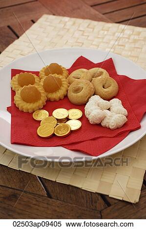 Still life of Chinese new year goodies View Large Photo Image Stock Photography - Still life of Chinese new year goodies. Fotosearch
