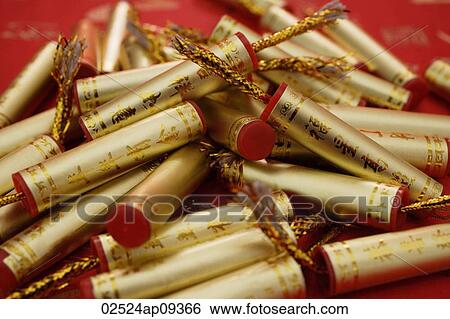 Stock Photograph - Still life of Chinese New Year decorations, fire-crackers. Fotosearch