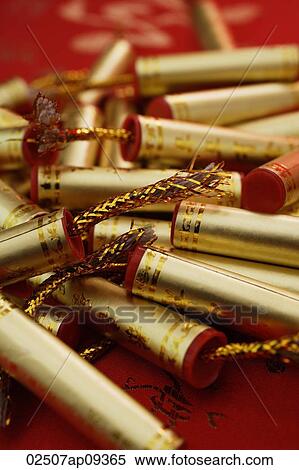 Still life of Chinese New Year decorations, fire-crackers View Large Photo Image Stock Photography - Still life of Chinese New Year decorations, fire-crackers. Fotosearch