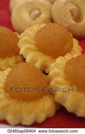 Still life of pineapple tarts and cashew nut cookies View Large Photo Image Picture - Still life of pineapple tarts and cashew nut cookies. Fotosearch