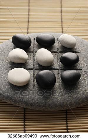 black and white pebbles on zen stone View Large Photo Image Stock Photo - black and white pebbles on zen stone. Fotosearch
