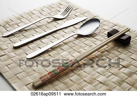 fork, knife, spoon and chopstick dinner setting View Large Photo Image Stock Image - fork, knife, spoon and chopstick dinner setting. Fotosearch