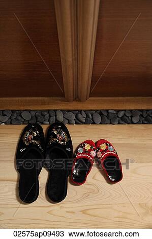 top view of red and black oriental slippers at door front View Large Photo Image Stock Image - top view of red and black oriental slippers at door front. Fotosearch