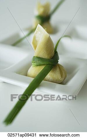 wanton dumplings placed on a white dish View Large Photo Image Stock Image - wanton dumplings placed on a white dish. Fotosearch
