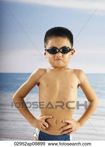 boy in googles posing with hands on hips View Large Photo Image Stock Photo - boy in googles posing with hands on hips. Fotosearch