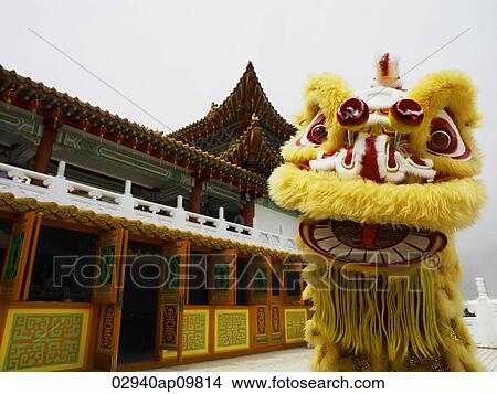 Chinese lion dance in front of temple View Large Photo Image Picture - Chinese lion dance in front of temple. Fotosearch