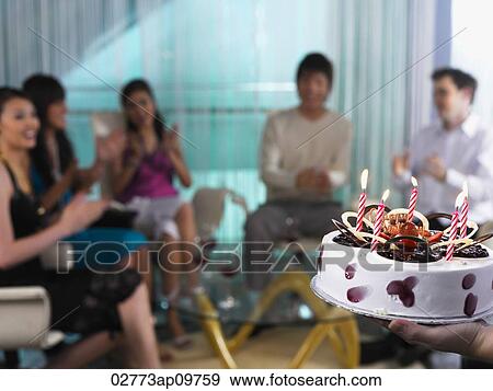 Group of people celebrating birthday View Large Photo Image Stock Photo - Group of people celebrating birthday. Fotosearch