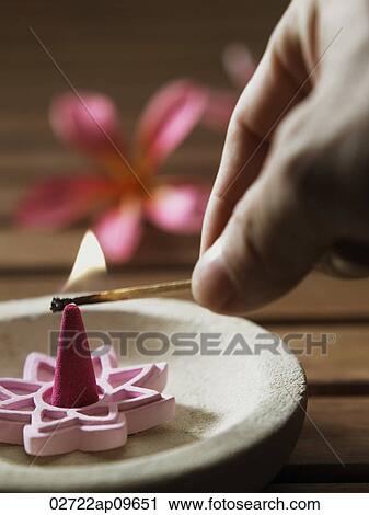 lighting up incense burner View Large Photo Image Stock Image - lighting up incense burner. Fotosearch