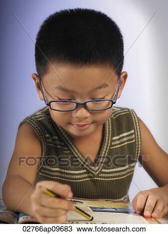 little boy reading a book View Large Photo Image Stock Image - little boy reading a book. Fotosearch