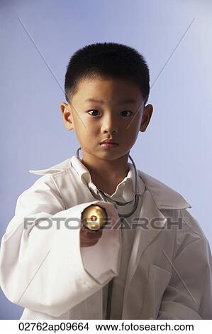little boy role playing as a doctor View Large Photo Image Picture - little boy role playing as a doctor. Fotosearch