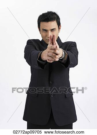 man making shooting hand signals View Large Photo Image Stock Photography - man making shooting hand signals. Fotosearch
