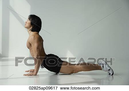 man practicing yoga View Large Photo Image Stock Photo - man practicing yoga. Fotosearch