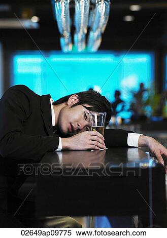 man relaxing at bar View Large Photo Image Stock Photography - man relaxing at bar. Fotosearch