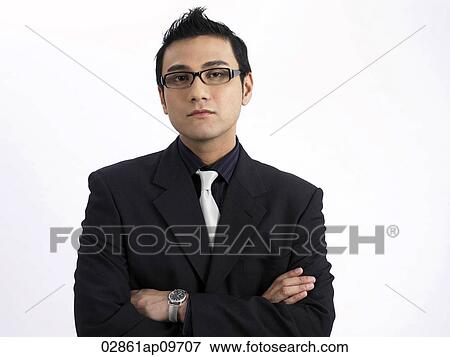 "man wearing dark rimmed glasses, arms crossed" View Large Photo Image Stock Photo - "man wearing dark rimmed glasses, arms crossed". Fotosearch