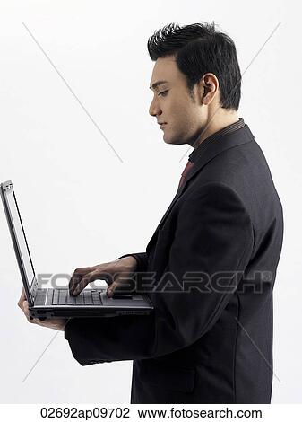 man working on laptop View Large Photo Image Stock Image - man working on laptop. Fotosearch