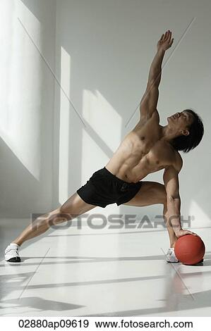 man working out with medicine ball View Large Photo Image Stock Photo - man working out with medicine ball. Fotosearch