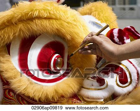 Person painting Chinese lion costume View Large Photo Image Stock Photo - Person painting Chinese lion costume. Fotosearch