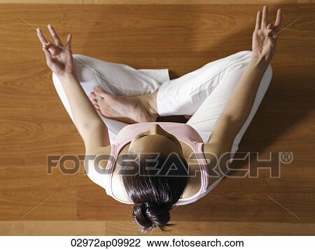 top view of girl doing yoga View Large Photo Image Stock Image - top view of girl doing yoga. Fotosearch