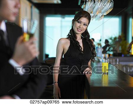 woman at bar staring at man View Large Photo Image Stock Photography - woman at bar staring at man. Fotosearch