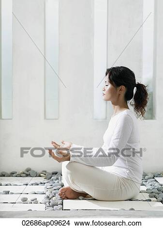 woman meditating View Large Photo Image Picture - woman meditating. Fotosearch