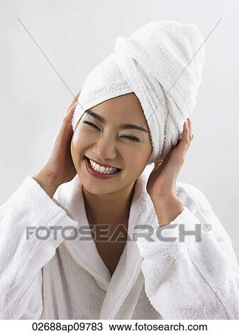 woman smiling with towel on her head View Large Photo Image Stock Image - woman smiling with towel on her head. Fotosearch