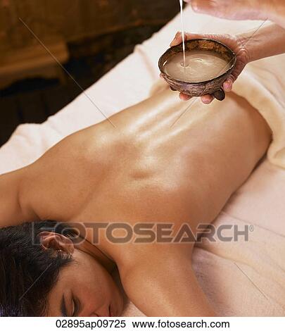 young man getting a spa massage View Large Photo Image Stock Photography - young man getting a spa massage. Fotosearch