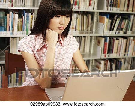 young woman studying at computer View Large Photo Image Stock Image - young woman studying at computer. Fotosearch