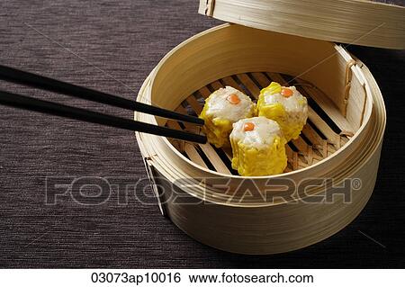 bamboo steamer with dimsum View Large Photo Image Stock Photograph - bamboo steamer with dimsum. Fotosearch
