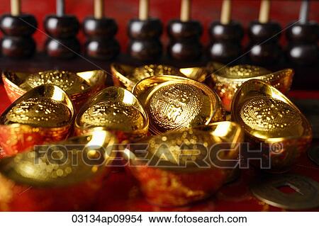 Close up of Chinese gold ingots and abacus. View Large Photo Image Picture - Close up of Chinese gold ingots and abacus.. Fotosearch